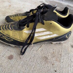 Black and Gold Soccer Cleats
